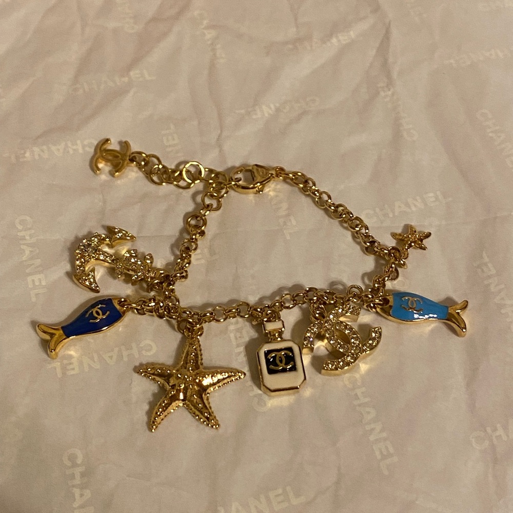 New authentic Chanel Gold and Blue Charm Bracelet - Picture 2 of 15